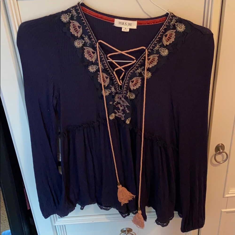 Cute navy top with pink embroidery!